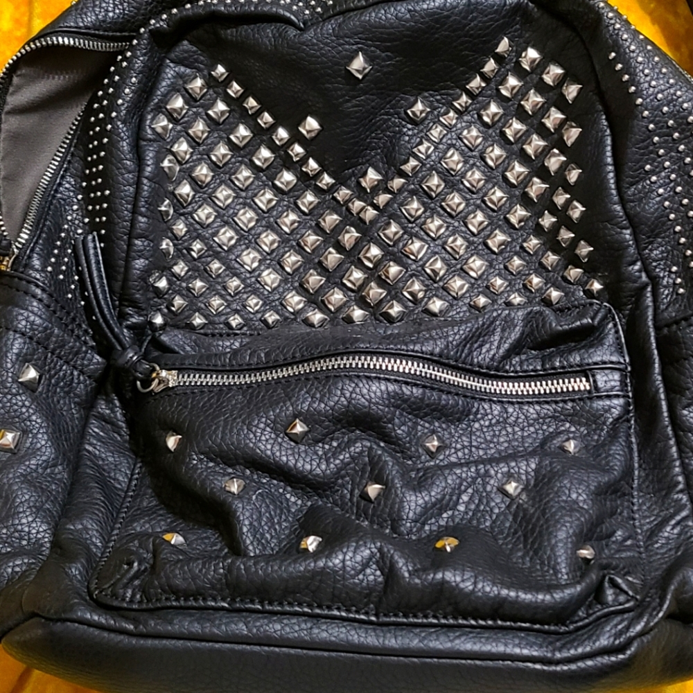 Leather studded backpack